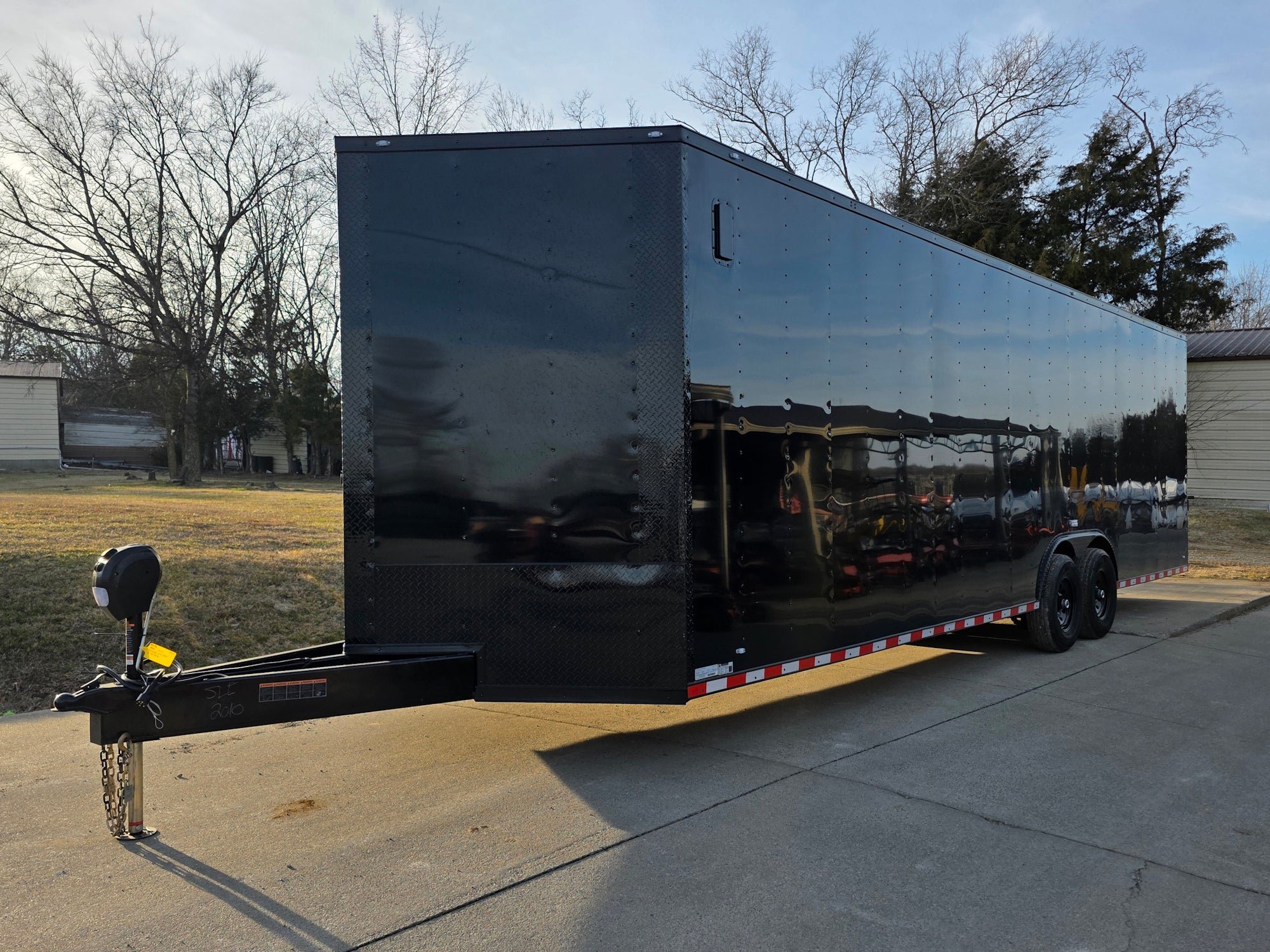 8.5x28 Black V-Nose Enclosed Trailer with Blackout Pkg (2) 7K Axles with D rings